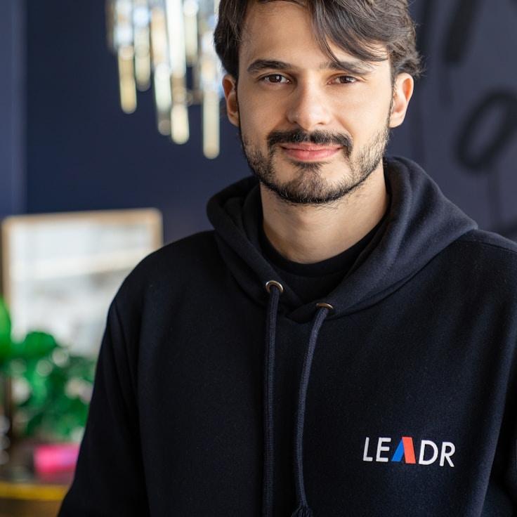 A former hospitality manager reviewing corporate floral arrangements